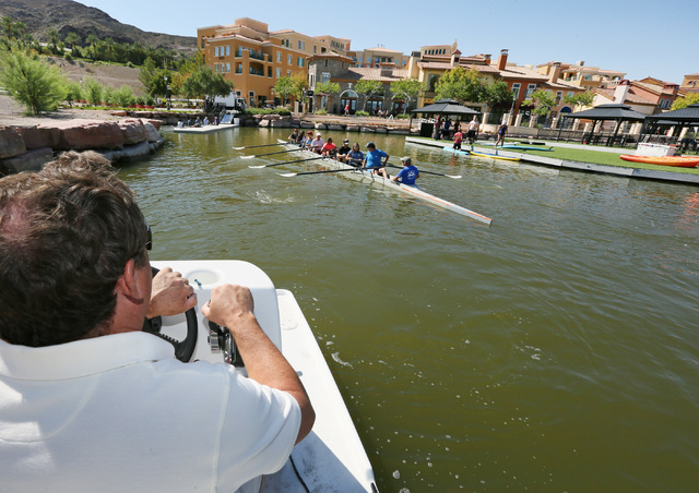 Jim Andersen, left, watches crew members rowing during a Learn to Row class at Lake Las Vegas Sept. 17. Ronda Churchill/View