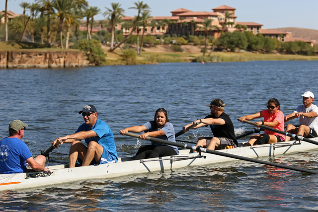 Coxswain Aaron Hastings, left, shouts during a Learn to Row class at Lake Las Vegas Sept. 17. Ronda Churchill/View