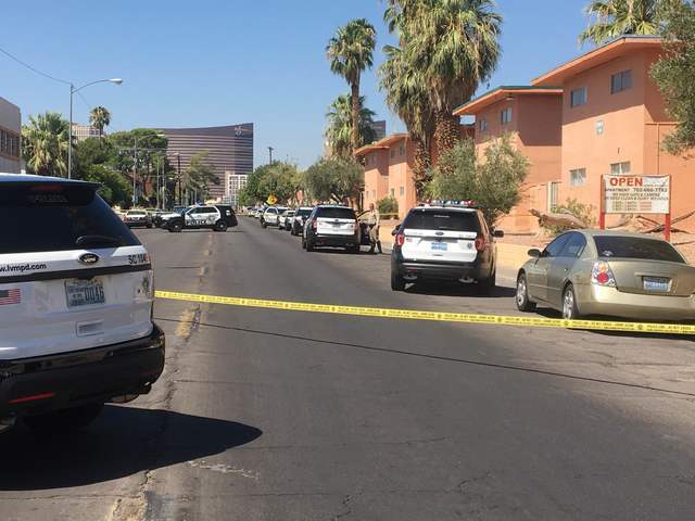 Police vehicles are shown at the scene of a shooting Friday in the 1100 block of Sierra Vista Drive, near the Boulevard Mall. (Daniel Clark/Las Vegas Review-Journal)