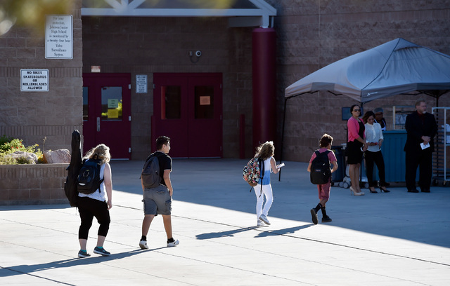 Students arrive at Johnson Junior High School Tuesday, Sept. 13, 2016, in Las Vegas. The school reopened after being closed for a mercury contamination cleaning since Thursday. David Becker/Las Ve ...