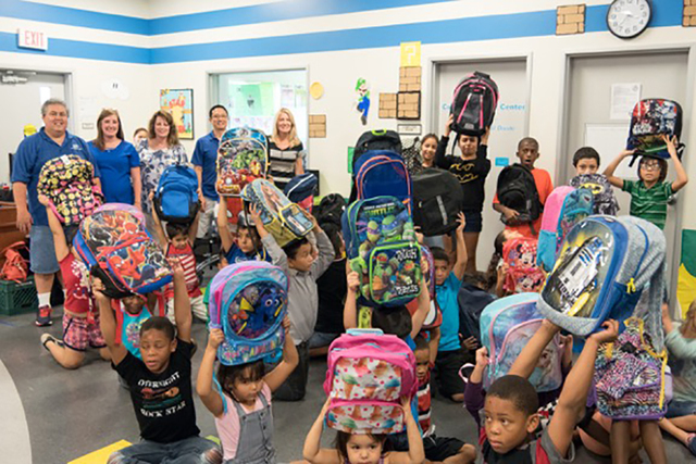 Local Realtors from the Nevada Association of Realtors delivered backpacks stuffed with school supplies to kids served by Boys & Girls Clubs over Aug. 20-21, 2016. Special to View