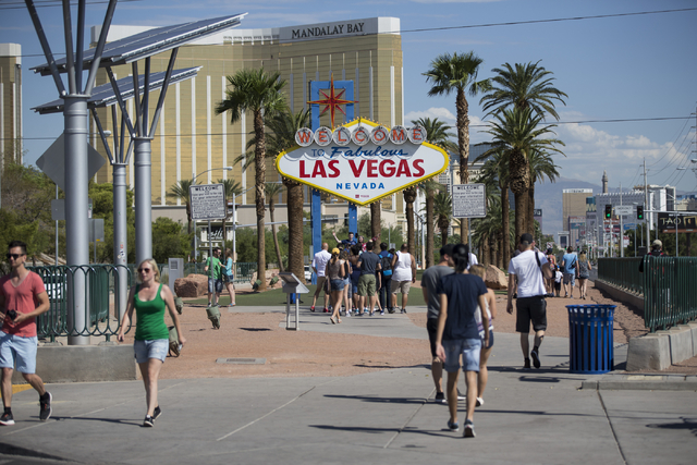 People take photos in front of the Welcome to Fabulous Las Vegas sign on Wednesday, Aug. 31, 2016, in Las Vegas. (Erik Verduzco/Las Vegas Review-Journal Follow @Erik_Verduzco)
