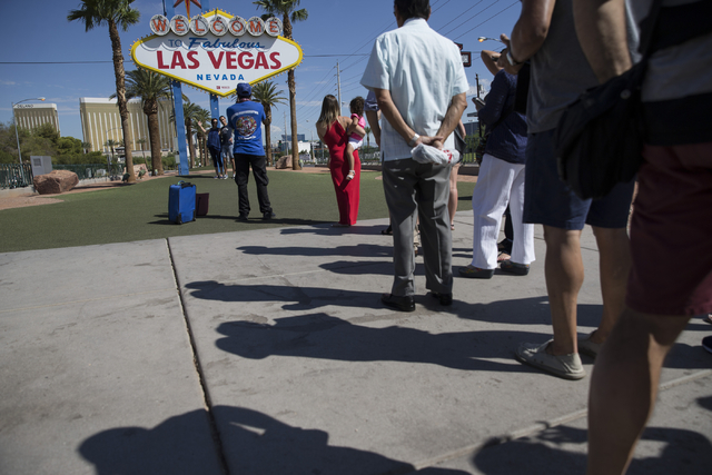 People line up to take a photo in front of the Welcome to Fabulous Las Vegas sign on Wednesday, Aug. 31, 2016, in Las Vegas. (Erik Verduzco/Las Vegas Review-Journal Follow @Erik_Verduzco)