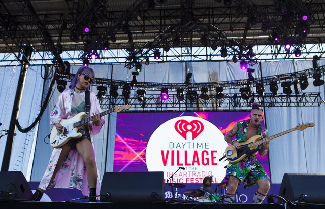 JinJoo Lee and Cole Whittle of DNCE perform at iHeartRadio's Daytime Village music festival is seen at the MGM Resorts Village festival site in Las Vegas, Saturday, Sept. 24, 2016. (Miranda Alam/L ...