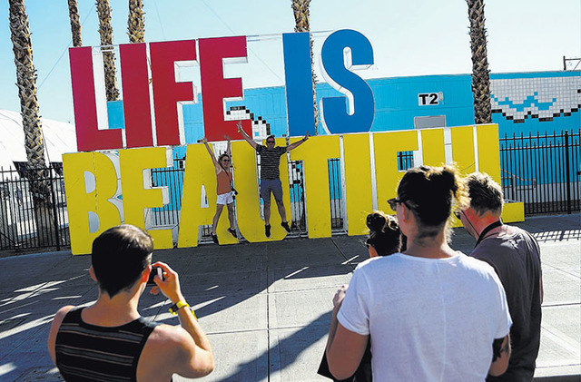 Attendees pose for a photo during the Life is Beautiful music and arts festival in downtown Las Vegas on Friday, Sept. 23, 2016. Chase Stevens/Las Vegas Review-Journal Follow @csstevensphoto