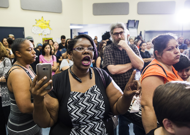 Consuela Nicole demands answers from an Environmental Protection Agency official during a town hall meeting at Jacobson Elementary School on Thursday, Sept. 8, 2016, in Las Vegas. The Clark County ...