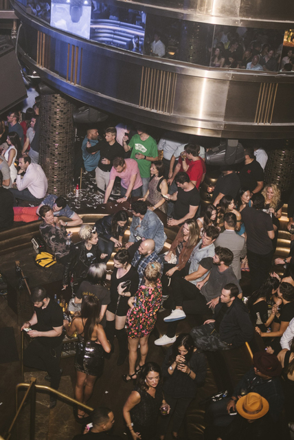 Miley Cyrus and Liam Hemsworth party Friday at Omnia. (Courtesy)
