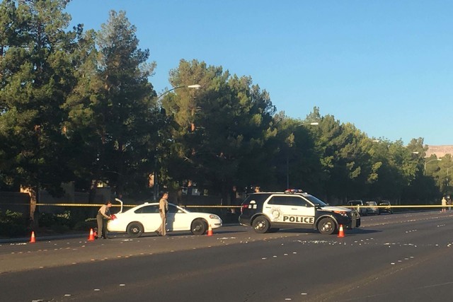 A Las Vegas motorcycle officer was hospitalized after being struck by a car on Tropicana Avenue near Durango Drive early Friday, Sept. 16, 2016. (Jessica Terrones/Las Vegas Review-Journal)