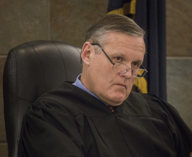 District Judge David Barker presides over the sentencing of Dina Palmer, the mother who pleaded guilty in beatings that led to the death of her 7-year-old son, Roderick "RJ" Arrington, on Wednesda ...