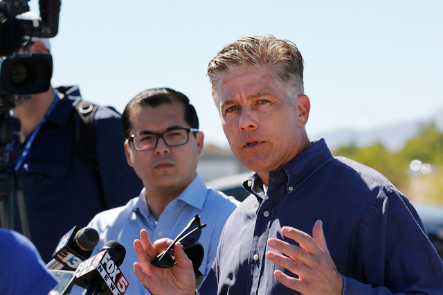 Las Vegas police Lt. Dan McGrath, right, speaks during a news conference in Las Vegas, Sunday, Sept. 25, 2016, after a shooting inside a Starbucks at a southwest valley strip mall. Chitose Suzuki/ ...