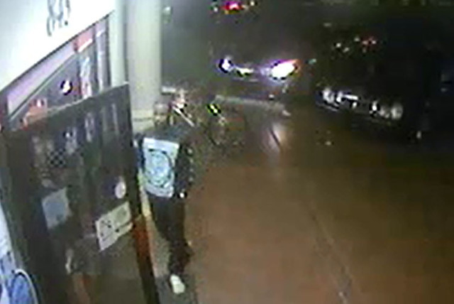 Security camera footages shows one of two suspects wanted in connection with an armed robbery in early September of a man seated in a car parked on the 5900 block of Bromley Avenue, near South Jon ...