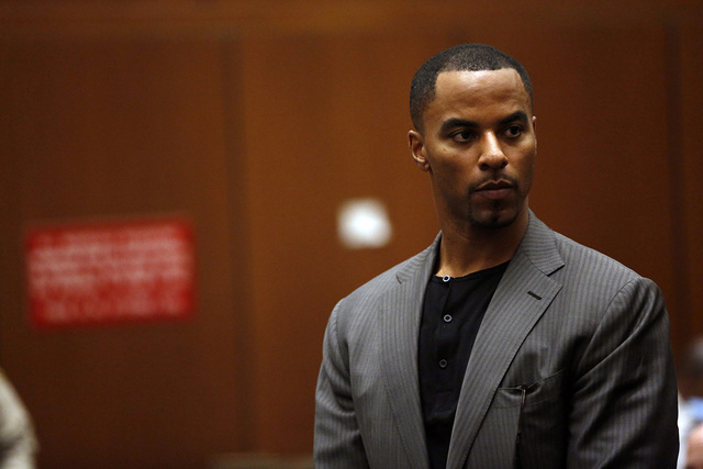 Former professional football player Darren Sharper appears for his arraignment at the Clara Shortridge Foltz Criminal Justice Center in Los Angeles, California February 20, 2014. (Mario Anzuon/Reu ...