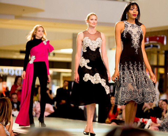 The fashion show culminated with an evening wear segment. The highlight was a jeweled pink Moschino top, paired with a DKNY bodysuit, pictured in rear.