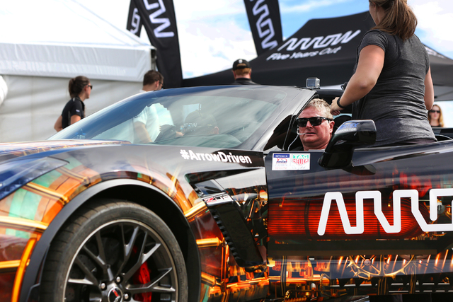 Sam Schmidt, in car, preps for a test run in his modified Corvette at Exotics Racing on Wednesday, Sept. 28, 2016, in Las Vegas. Schmidt is the first person in the country to receive a restricted  ...