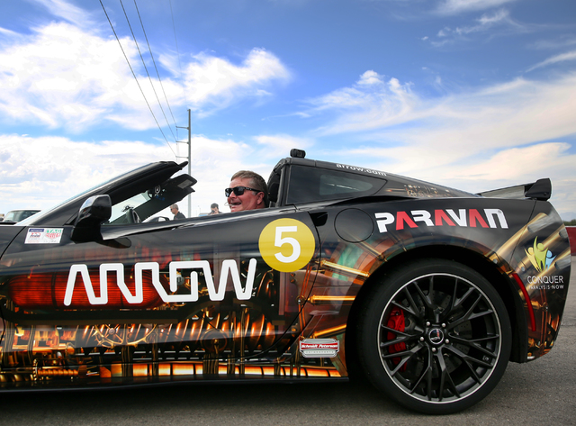 Sam Schmidt smiles at his family after completing a test run in his modified Corvette at Exotics Racing on Wednesday, Sept. 28, 2016, in Las Vegas. Schmidt is the first person in the country to re ...