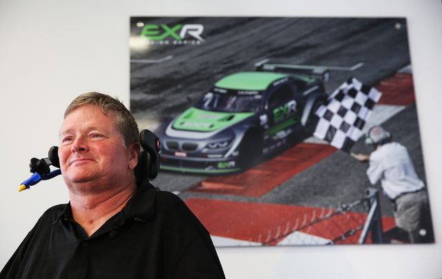 Sam Schmidt takes questions from the media after completing a test run in his modified Corvette at Exotics Racing on Wednesday, Sept. 28, 2016, in Las Vegas. Schmidt is the first person in the cou ...