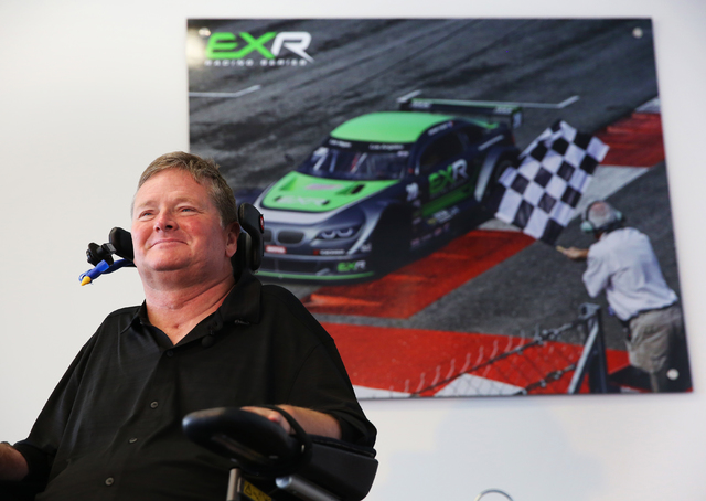 Sam Schmidt takes questions from the media after completing a test run in his modified Corvette at Exotics Racing on Wednesday, Sept. 28, 2016, in Las Vegas. Schmidt is the first person in the cou ...