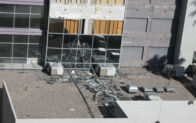 Debris and other mangled materials are seen on a roof of the former Atrium Suites Hotel property located at 4255 Paradise Road in Las Vegas, Wednesday, Sept. 14, 2016. (David Becker/Las Vegas Revi ...