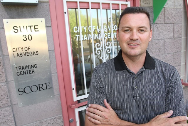 Murray Hickman III, owner of Diversified Communications Solutions Inc., poses before attending the NxLeveL for Entrepreneurs small business course at the Urban Chamber of Commerce in Las Vegas on ...