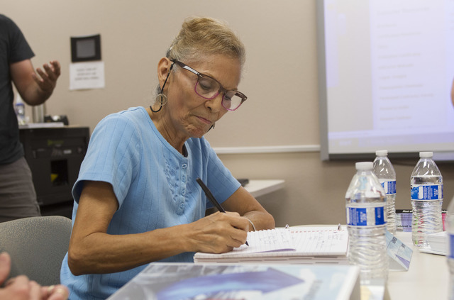 Las Vegas resident Margarita Rodela takes notes during the NxLeveL for Entrepreneurs small business course at the Urban Chamber of Commerce in Las Vegas on Wednesday, Aug. 31, 2016. (Richard Bria ...