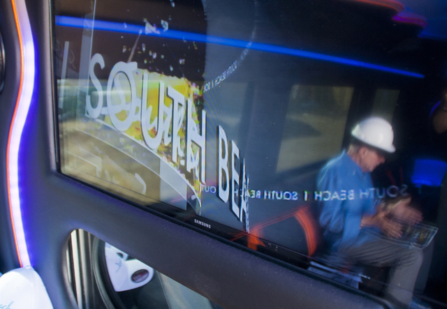 Bob Schulman is reflected in the on-board television inside a Mercedes-Benz van parked at the future site of the South Beach luxury apartment complex in Las Vegas on Thursday, Sept. 8, 2016. Danie ...