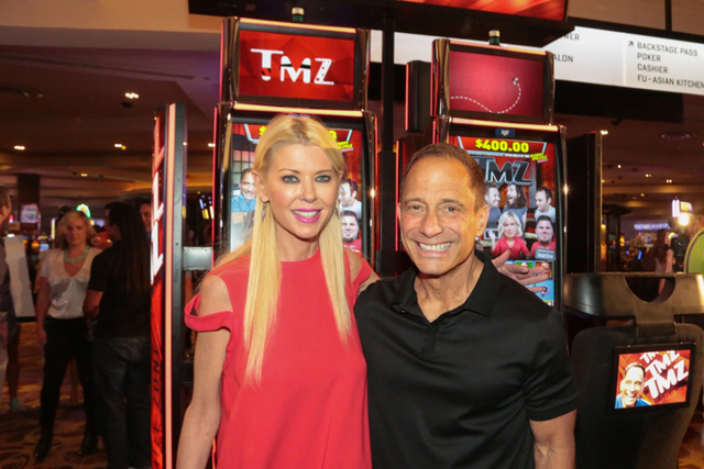 Tara Reid and TMZ chief Harvey Levin at the Aug. 29 launch of TMZ slots at the Hard Rock Hotel. (Edison Graf for Kabik Photo Group)