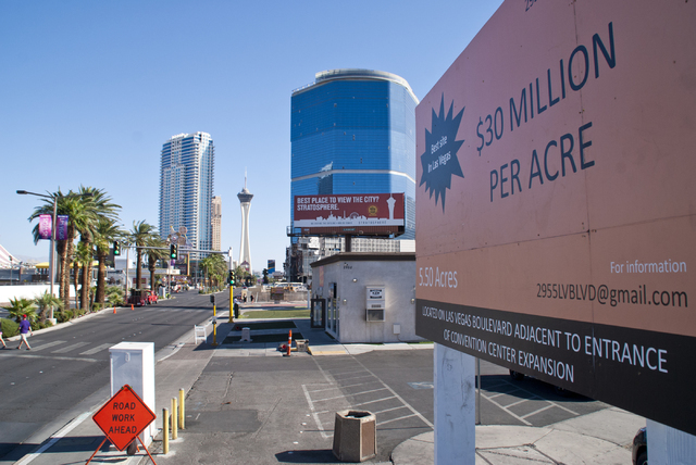 A sign advertises a 5.5 acre lot for sale near the site where the Riviera hotel-casino once stood in Las Vegas on Friday, Sept. 23, 2016. The sellers are asking for $30 million per acre. Daniel Cl ...