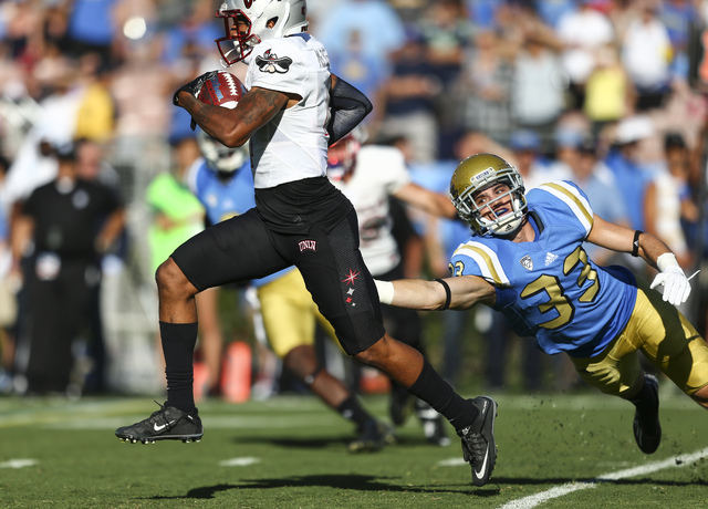 UNLV Rebels defensive back Torry McTyer (4) runs the ball against UCLA during a football game at the Rose Bowl in Pasadena, Calif. on Saturday, Sept. 10, 2016. Chase Stevens/Las Vegas Review-Journ ...