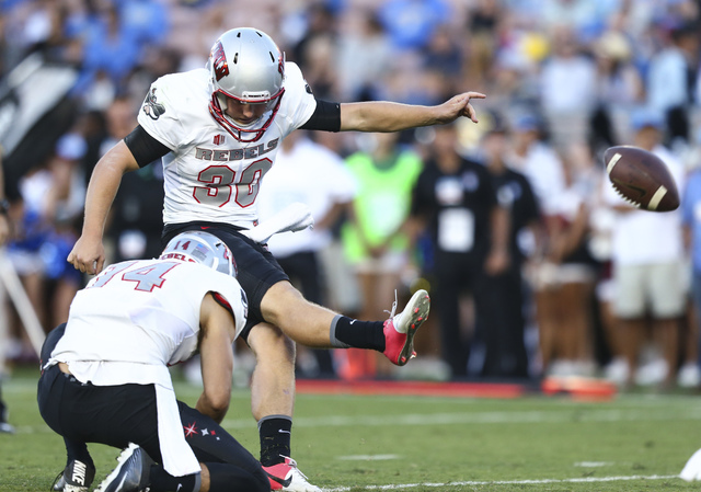UNLV Rebels place kicker Evan Pantels (30) punts the ball to score against UCLA during a football game at the Rose Bowl in Pasadena, Calif. on Saturday, Sept. 10, 2016. Chase Stevens/Las Vegas Rev ...