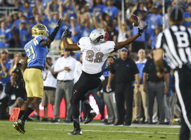 UNLV Rebels tight end Andrew Price (88) reaches out to catch a pass against UCLA during a football game at the Rose Bowl in Pasadena, Calif. on Saturday, Sept. 10, 2016. UCLA won 42-21. Chase Stev ...