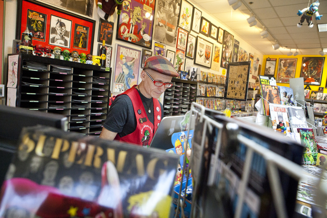 Ralph Mathieu, the owner of Alternate Reality Comics, helps a customer at his store in Las Vegas on Friday, Sept. 2, 2016. (Loren Townsley/Las Vegas Review-Journal) Follow @lorentownsley