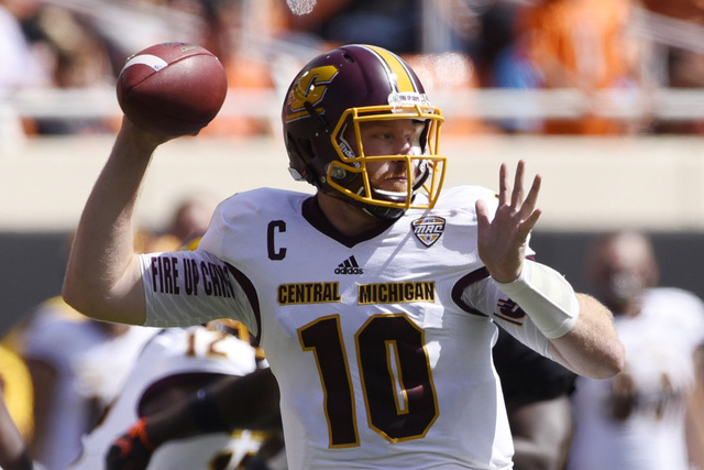 Central Michigan quarterback Cooper Rush throws a pass during the first half of an NCAA college football game against Oklahoma St in Stillwater, Okla., Saturday, Sept. 10, 2016.(AP Photo/Brody Sch ...
