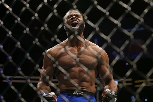 Tyron Woodley reacts after knocking out Robbie Lawler (not shown) in the first round for the world welterweight championship during UFC 201 at Phillips Arena. (Butch Dill/USA Today Sports)