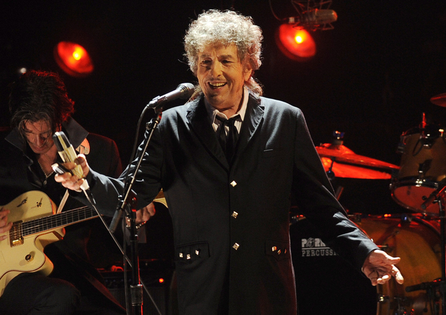In this Jan. 12, 2012, file photo, Bob Dylan performs in Los Angeles. Dylan was named the winner of the 2016 Nobel Prize in literature Thursday, Oct. 13, 2016, in a stunning announcement that for  ...