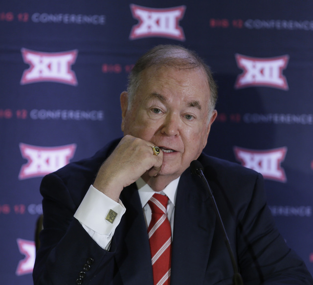 In this June 2, 2016, file photo, University of Oklahoma President David Boren speak to reporters after the second day of the Big 12 sports conference meetings in Irving, Texas. The Big 12 board o ...