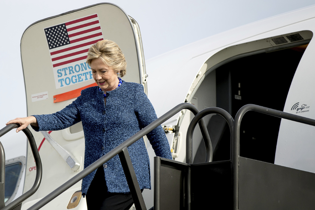 Democratic presidential candidate Hillary Clinton arrives at Eastern Iowa Airport in Cedar Rapids, Iowa, Friday, Oct. 28, 2016, to attend a rally. (Andrew Harnik/AP)