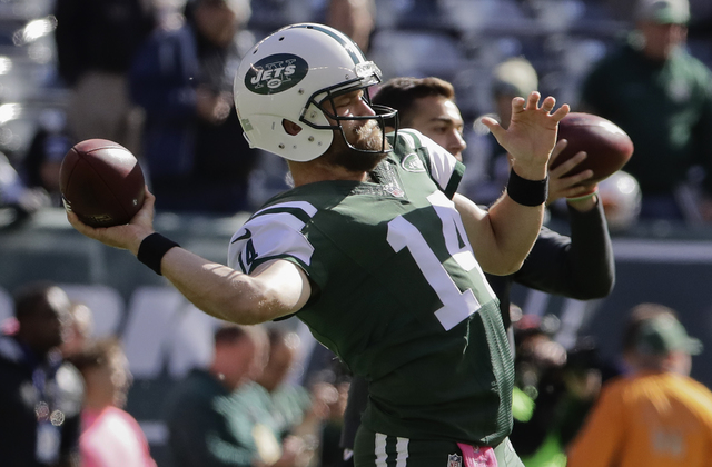 In this Oct. 23, 2016, file photo, New York Jets quarterback Ryan Fitzpatrick (14) warms up before an NFL football game against the Baltimore Ravens, in East Rutherford, N.J. Fantasy owners lookin ...