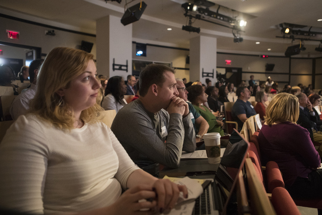 Charlotte Buys, left, and James Lovett listen to a speaker at the Mental and Behavioral Health Coalition forum at UNLV Oct. 7, 2016, in Las Vegas. Loren Townsley/View Follow @lorentownsley