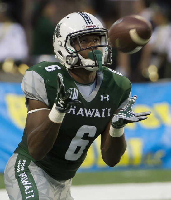 Hawaii running back Paul Harris catches the opening kickoff of an NCAA college football game against UNLV, Saturday, Oct. 15, 2016, in Honolulu. (Eugene Tanner/AP)