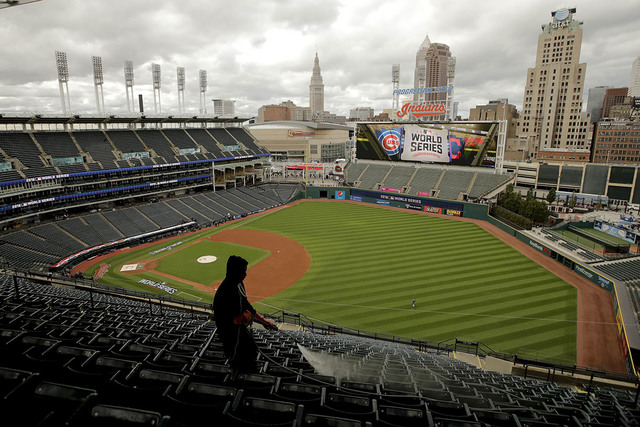 A worker prepares the stadium for baseball's upcoming World Series between the Cleveland Indians and the Chicago Cubs, Monday, Oct. 24, 2016, in Cleveland. (Charlie Riedel/AP)