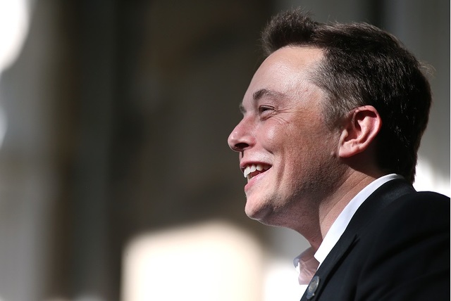 Tesla Motors CEO Elon Musk speaks at a press conference at the Capitol in Carson City, Nev., on Thursday, Sept. 4, 2014. (AP Photo/Cathleen Allison)