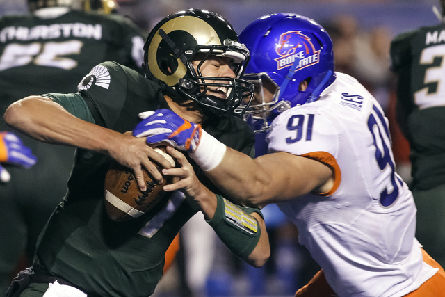 Colorado State quarterback Nick Stevens (7) is sacked by Boise State defensive end Durrant Miles (91) during the second half of an NCAA college football game in Boise, Idaho, Saturday, Oct. 15, 20 ...