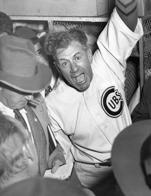 In this Oct. 8, 1945 file photo, Chicago Cubs manager Charlie Grimm Manager celebrates the Cubs 8-7 victory in the sixth game of the World Series in 12 innings at Wrigley Field in Chicago.  (Mel L ...