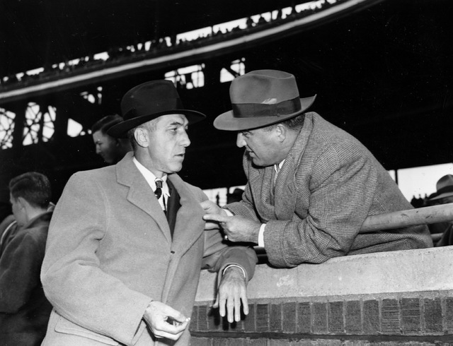 Baseball commissioner A.B. Chandler, right, talks with National League President Ford Frick before the final World Series game in Chicago, Oct. 10, 1945. The Detroit Tigers won 4 games and Chicago ...
