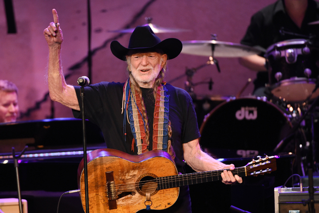 In this Feb. 5, 2015 file photo, Willie Nelson performs at the 17th Annual GRAMMY Foundation Legacy Concert at the Wilshire Ebell Theatre in Los Angeles. (Chris Pizzell/Invision/AP)