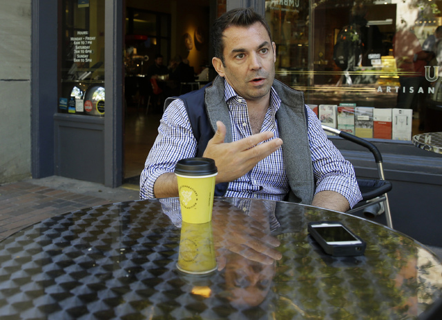 Chris Hansen, the investor attempting to build a new NBA basketball and NHL hockey arena in Seattle, takes part in an Associated Press interview, Tuesday, May 26, 2015, at a cafe in Seattle not fa ...