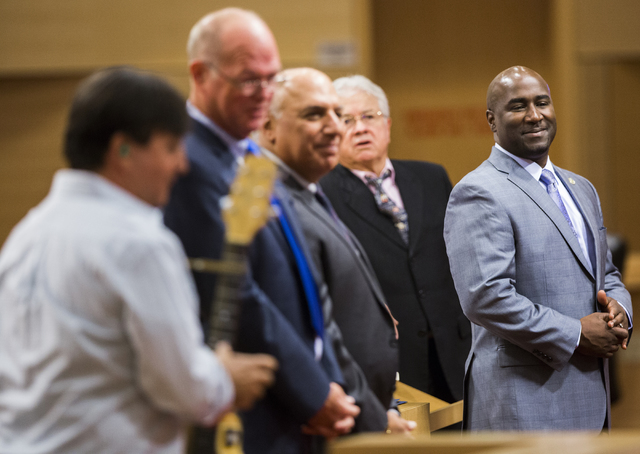 Las Vegas City Councilman Ricki Barlow, right, listens to a musical performance at a meeting of the Las Vegas City Council on Wednesday, Oct. 05, 2016, in Las Vegas. The FBI recently subpoenaed ca ...