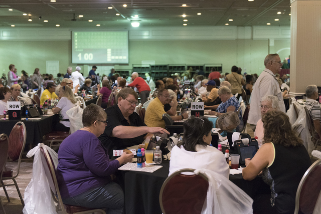 Gamblers mingle between rounds during the Super Bingo tournament at the Plaza hotel-casino in Las Vegas, Tuesday, Oct. 4, 2016. (Jason Ogulnik/Las Vegas Review-Journal)