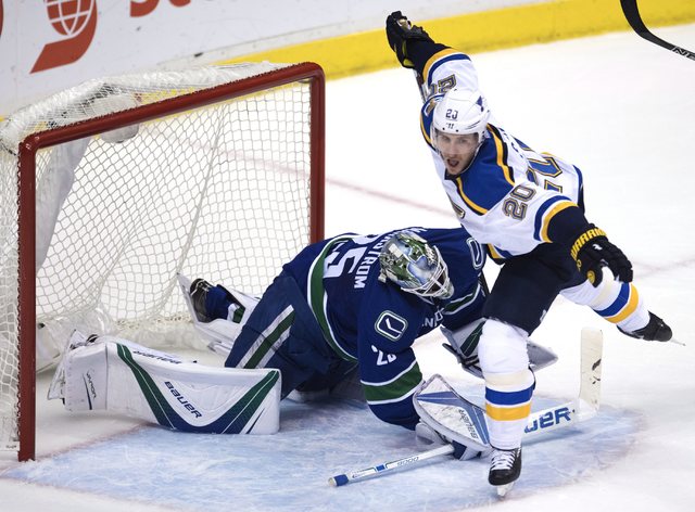 St. Louis Blues left wing Alexander Steen (20) is stopped by Vancouver Canucks goalie Jacob Markstrom (25) during the second period of an NHL hockey game Tuesday, Oct. 18, 2016, in Vancouver, Brit ...