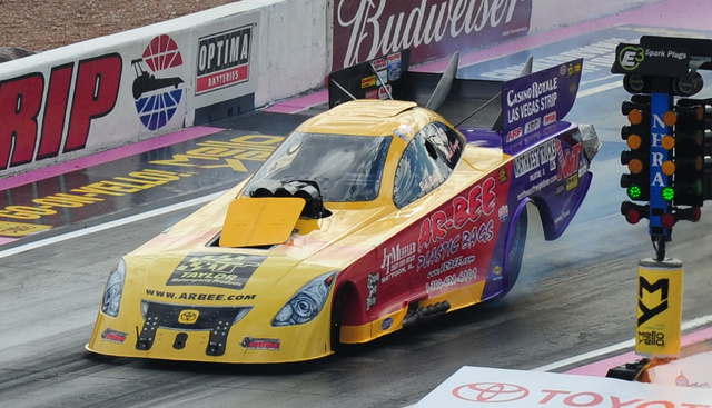 The burst panel onboard the Funny Car driven by Bob Bode pops off in the first qualifying session for the NHRA Mello Yello Series Toyota Nationals at The Strip at Las Vegas Motor Speedway in Las V ...